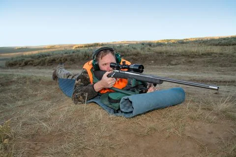 Long range rifle hunter Stock Photos