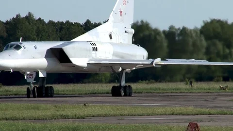 Long-range supersonic bomber Tu-22M3 taxis on runway after landing. Stock Footage 111313327