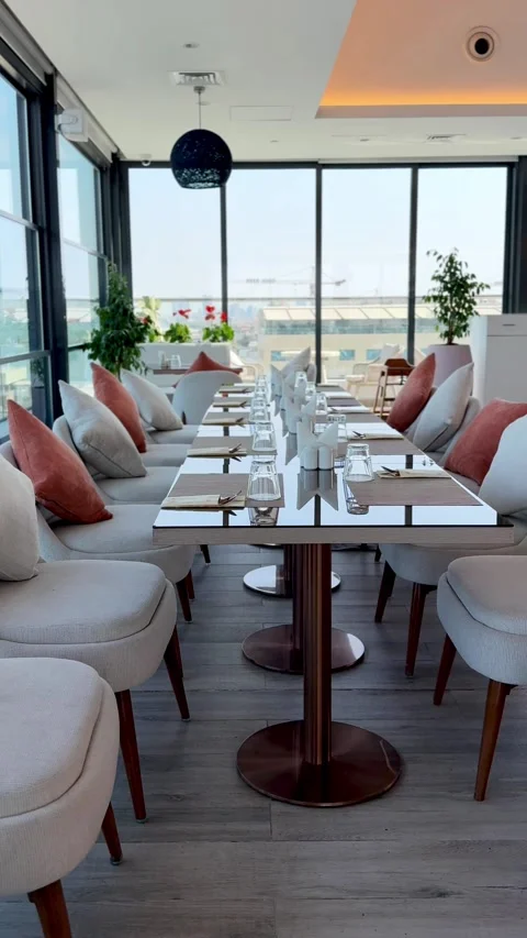 Long Restaurant Dining Table With Window View Stock Footage 345370274