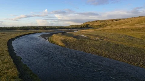 Long river flowing through rural landscape Stock Footage 74906948