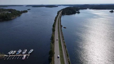 Long road between lake in summer Finland Stock Footage 327036379