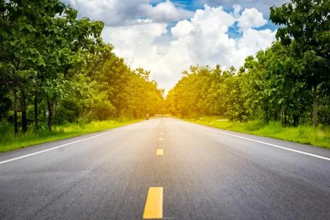 Long road on hills Stock Photos