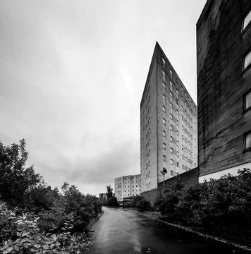 A long road next to a group of student accomodation buildings. Stock Photos