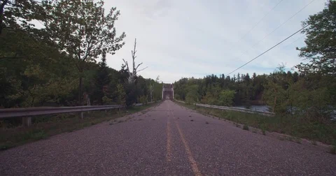 Long Road to Old Dead River Bridge Wide Static Stock Footage 71329581