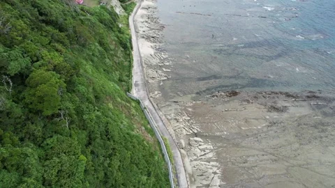 A long road on the side of a mountain Stock Footage 319907582