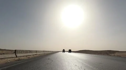 Long road trip across Cairo Fayoum Desert Road natural desert surroundings Vidéo 329830228