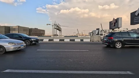 Long road trip through Cairo Fayoum Desert Road open desert horizon views Stock Footage 330090573