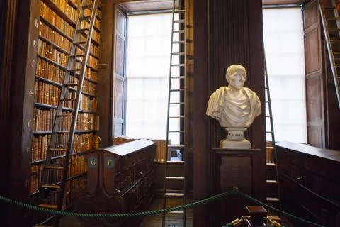 The Long Room interior Of The Old Library At Trinity College. Marble busts of Stock Photos