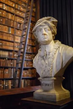 The Long Room interior Of The Old Library At Trinity College. Marble busts of Stock Photos