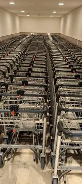 Long rows of folded luggage carts at airports and supermarkets Stock Photos