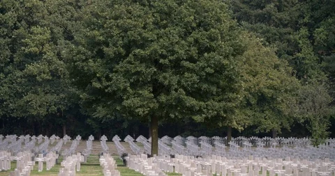 Long rows of tombstones at German war cemetery Ysselsteyn, Netherlands Stock Footage 95090102