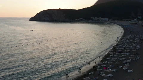 Long sandy beach after sunset. Stock Footage 137538378