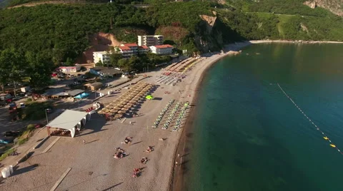 Long sandy beach and Adriatic sea are in Jaz, Budva municipality. Montenegro Stock Footage 64861604