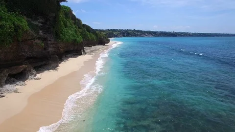 Long sandy beach and azure ocean of Bali island Stock Footage 108676718