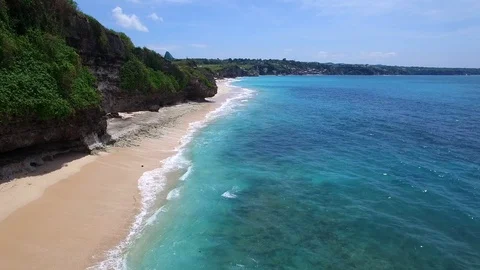 Long sandy beach and azure ocean of Bali island Stock-Footage 108676962