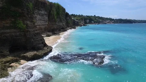 Long sandy beach and azure ocean of Bali island Stock Footage 108677821