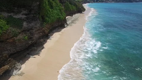 Long sandy beach and azure ocean of Bali island Stock Footage 108677882