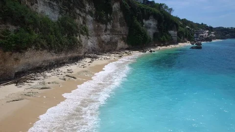 Long sandy beach and azure ocean of Bali island 動画素材 108678119