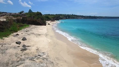 Long sandy beach and azure ocean of Bali island Stock Footage 108679573