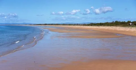 Long Sandy Beach With Tide Out Stock Photos
