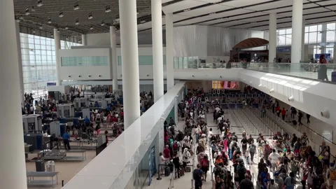Long security lines at an airport Stock Footage 279900158