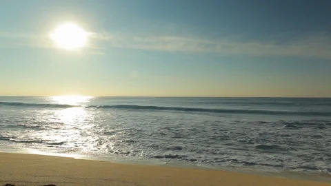 Long sequence of waves crashing on beautiful beach in tropical paradise C Stock Footage 120407392