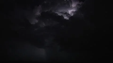 Long serie of lightnings and thunderbolts with dark tropical clouds. Stock Footage 42301765