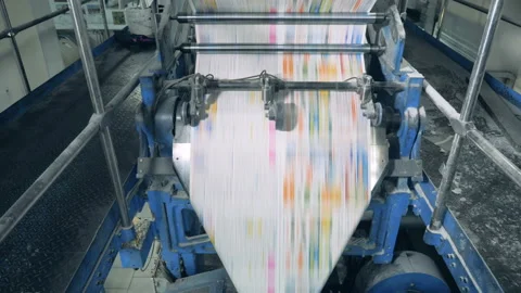 Long sheets of newspaper on a typographical conveyor, automated belt. Video stock 107459405