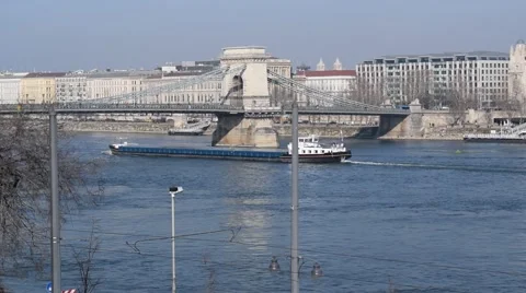 A long ship passing under the Chain Bridge in Budapest, Hungary Stock Footage 47721957