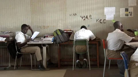 Long shot of African students studying at school individually- Education Africa Stock Footage 58993435