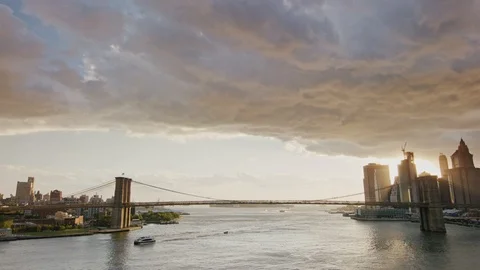 Long shot Brooklyn Bridge linking Brooklyn and Manhattan at sunset Stock Footage 99033877