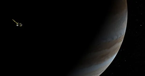 Long shot: the Cassini spacecraft in orbit around Jupiter Stock Footage 91333596