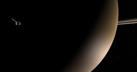 Long shot: the Cassini spacecraft in orbit around Saturn Stock Footage 91333732