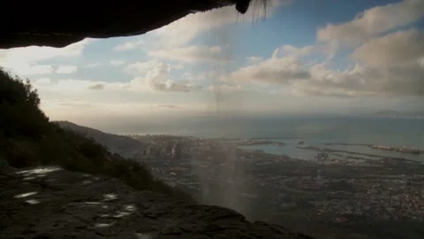 Long shot of cave opening Stock Footage 310385601