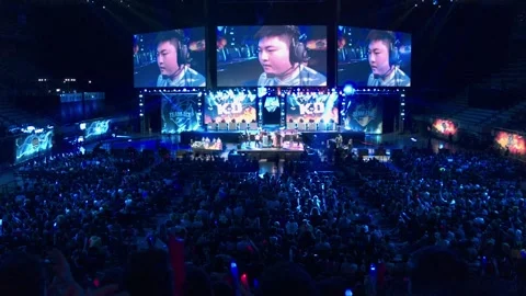 Long shot of a crowded stadium celebrating the KO of a videogames proplayer Stock Footage 157826352