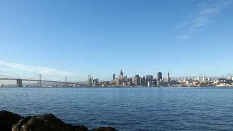 A long shot of downtown San Francisco and Oakland Bay Bridge Stock Footage