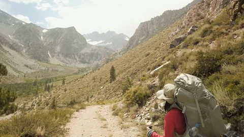 Long Shot of Female Backpacker, Alpine High Sierra Mountain Range, California Stock Footage 116068546