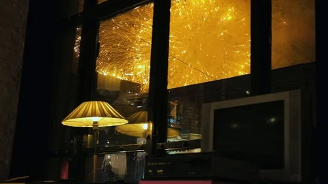 Long shot of fireworks exploding over downtown New York at night 動画素材 126934162