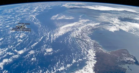 Long shot: flying parallel to the ISS, over Central America Stock Footage 120145097