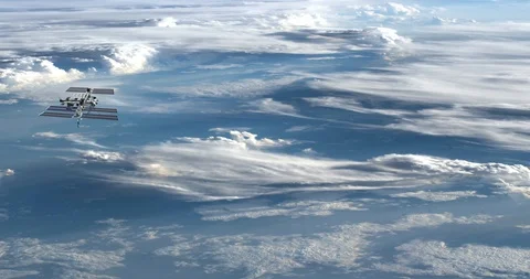 Long shot: flying parallel to the ISS, over an African cloudscape Video stock 120146064