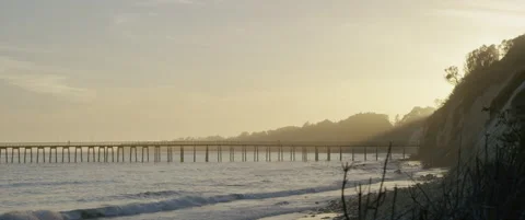 Long shot on light rays on Santa Barbara pier at sunset Stock Footage 136276961
