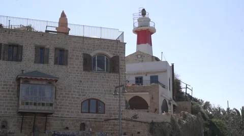 Long Shot on Lighthouse Tilt Down on Boat Jaffa Tel-Aviv-Jaffa Israel Stock Footage 52537998