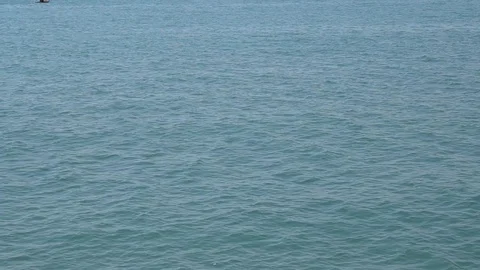 LONG SHOT LOOKING DOWN AT GENTLE LAKE MICHIGAN WAVES Stock Footage 106092269