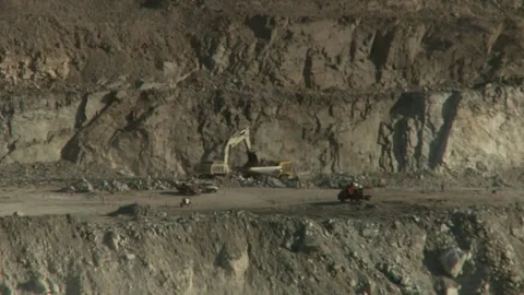 Long shot of machinery working on opencast mine Stock Footage 312400357