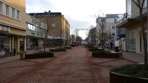 Long shot pan in the main walking and shopping street of Mariehamn aland Finland Stock Footage 88880737