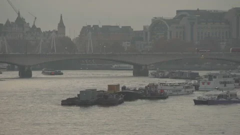 Long shot of river Thames, bridges and a passenger ferry Stock Footage 146455286