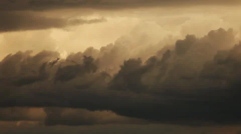 Long shot of rolling cumulous clouds Stock Footage 60754854