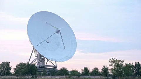 Long shot of the satellite array with trees Stock Footage 82118436