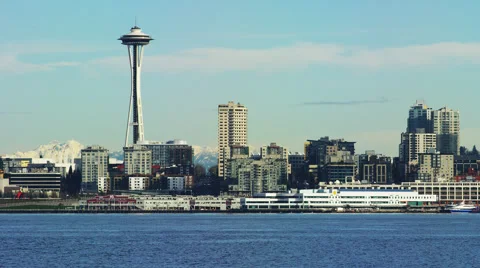 Long shot of Seattle Space Needle and skyline from across Elliott Bay. Stock Footage 62848118