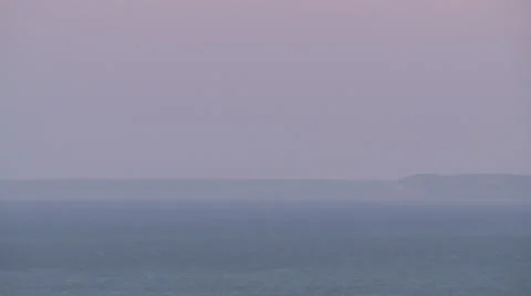 Long shot of a ship sailing along the shore. Stock Footage 39483664